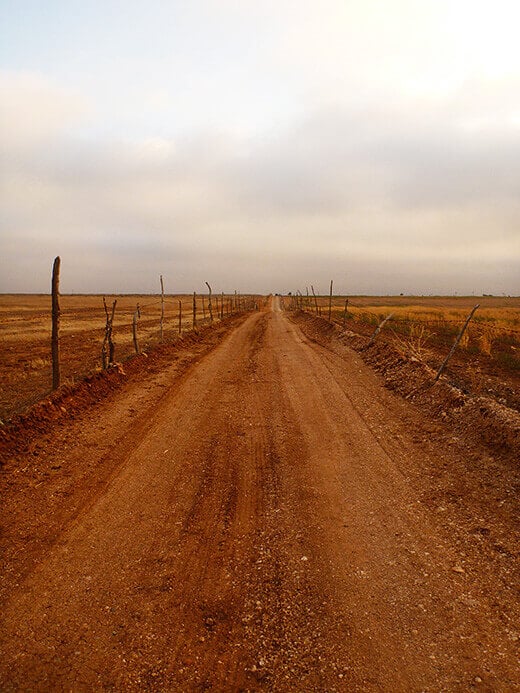 Speeding down a dirt road to chase the solar eclipse